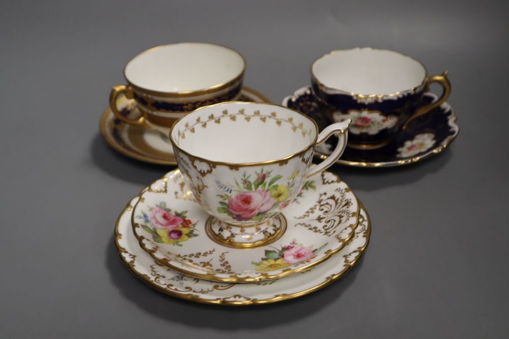 A Royal Crown Derby teacup, a saucer and a tea plate,